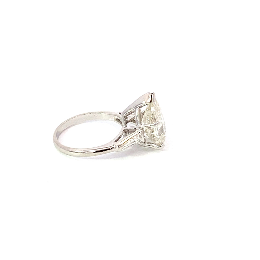 Plat eng ring 4.85cts Pear Sha