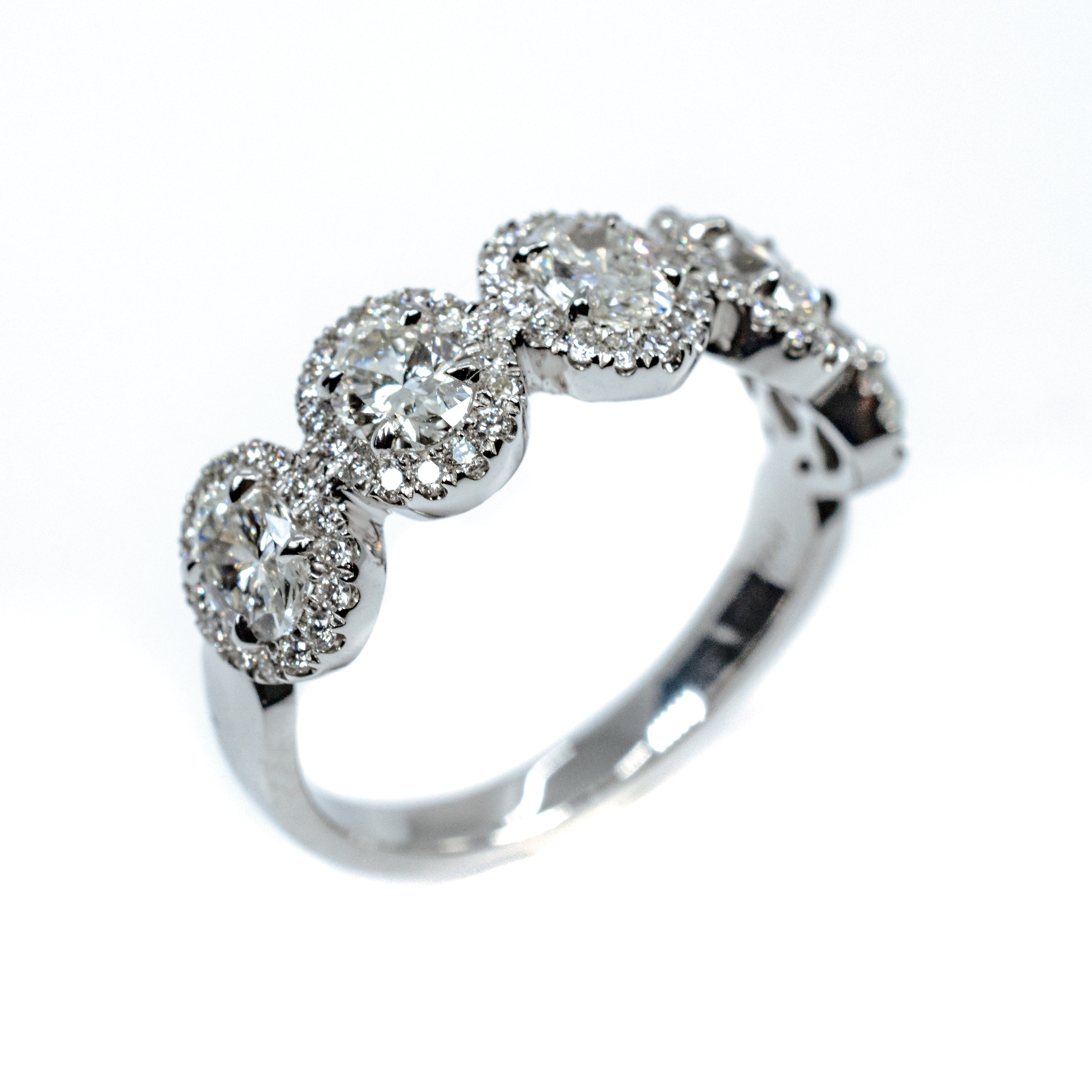Plat 5-Oval diamond w/halo rin