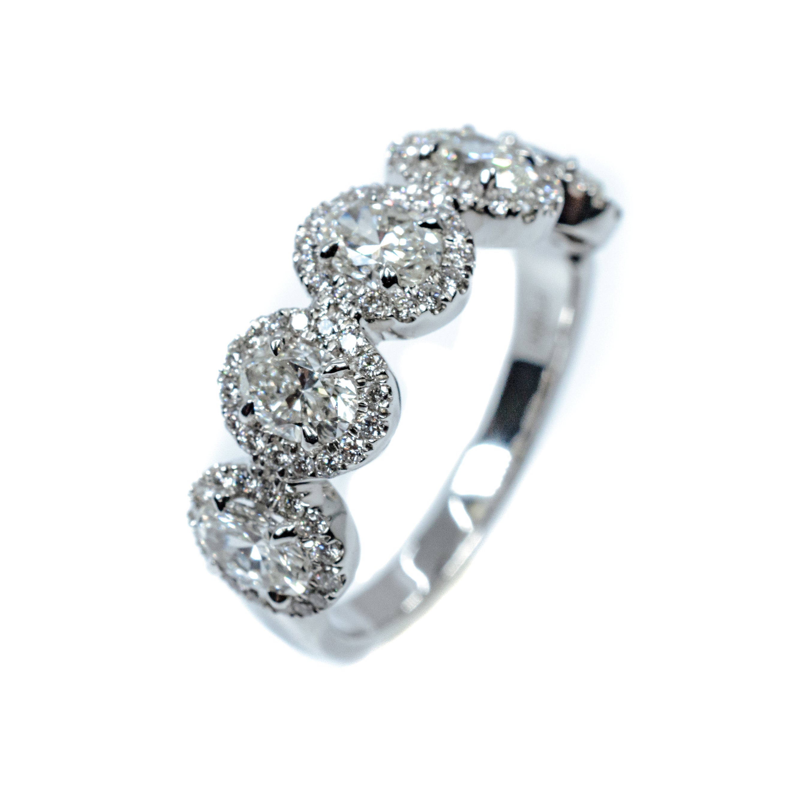 Plat 5-Oval diamond w/halo rin