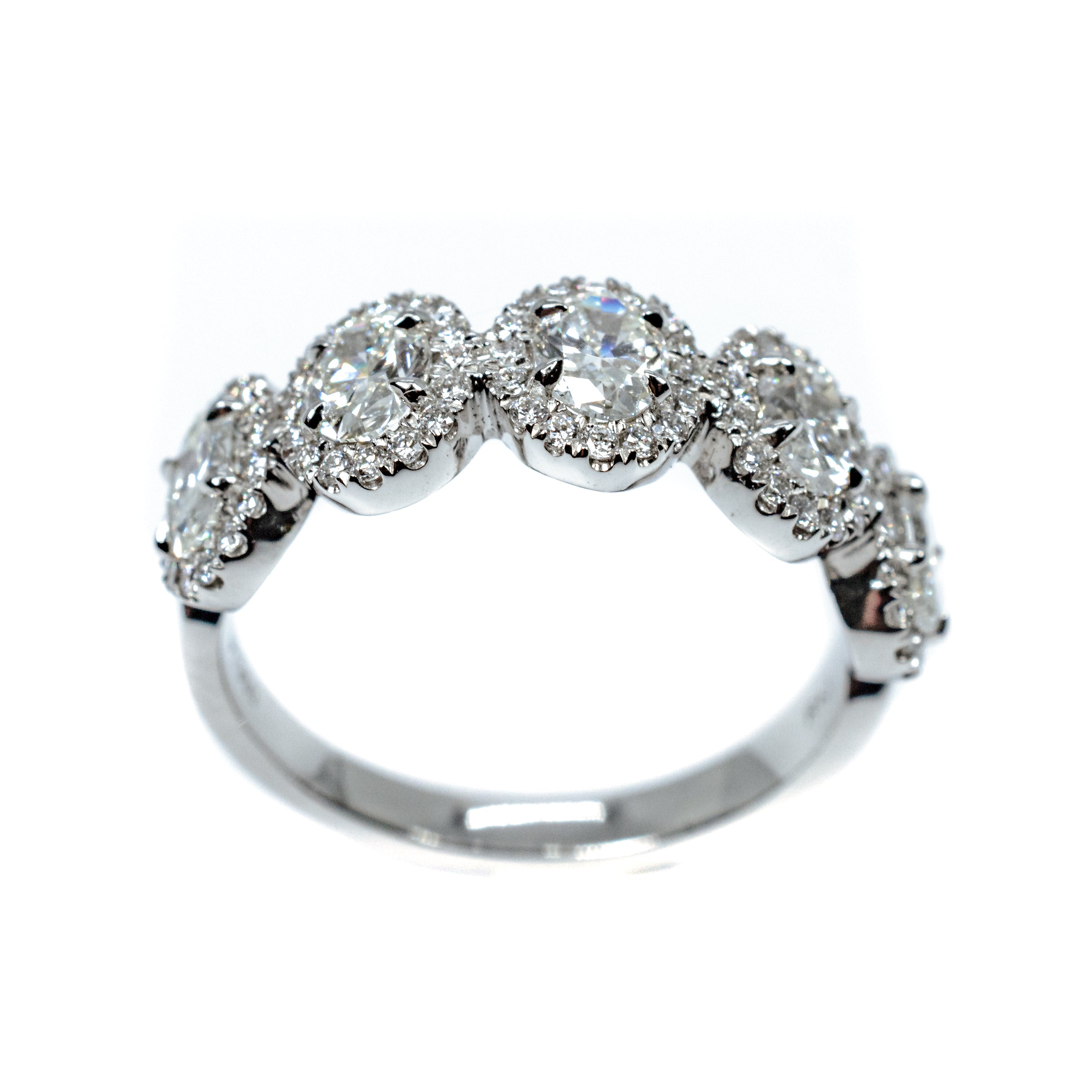 Plat 5-Oval diamond w/halo rin