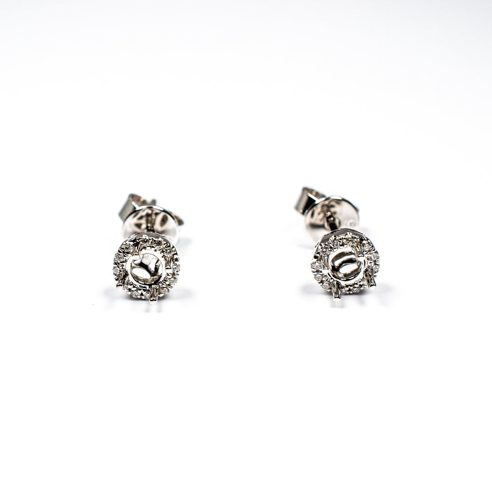 14kt wg smnt dia earrings 24=.