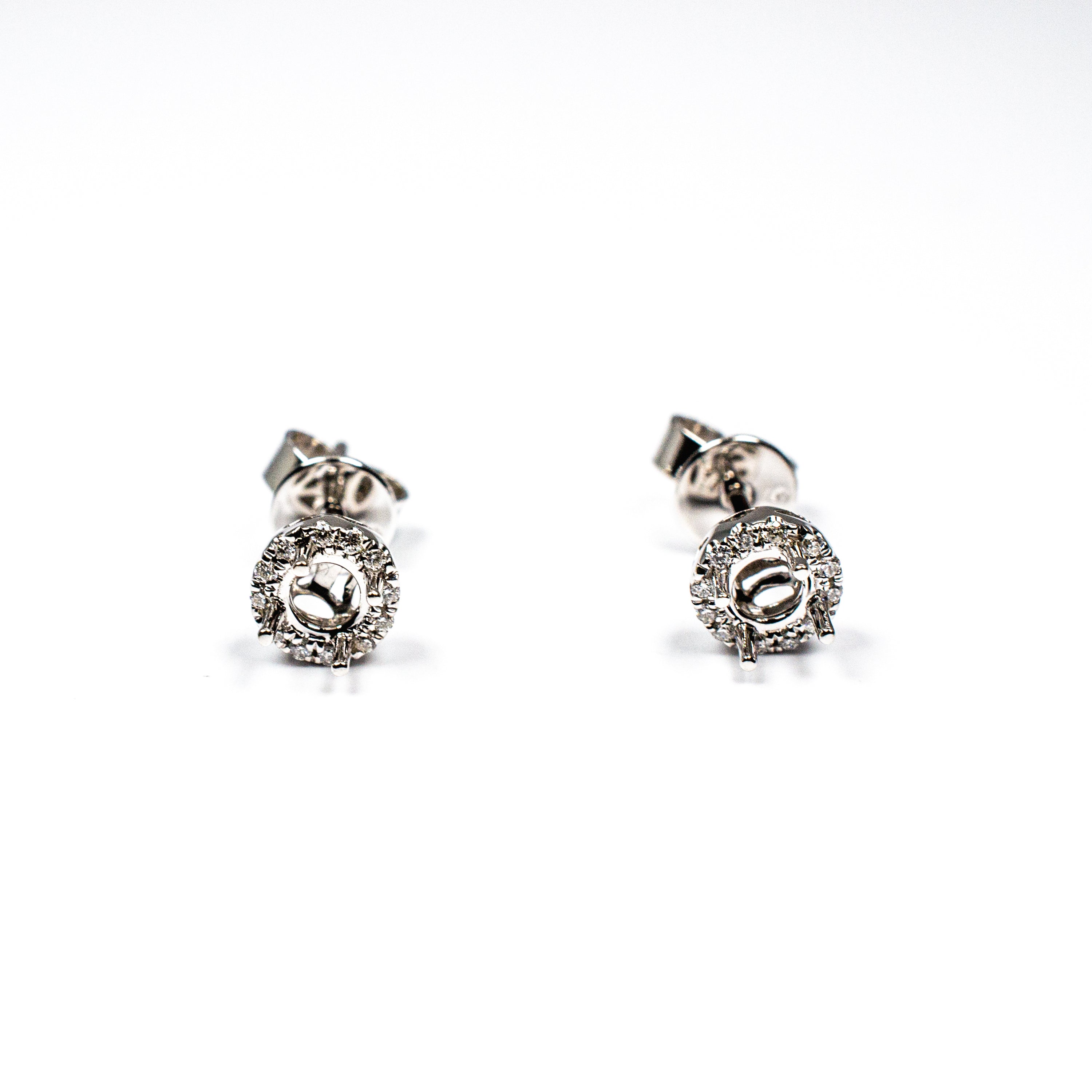 14kt wg smnt dia earrings 24=.
