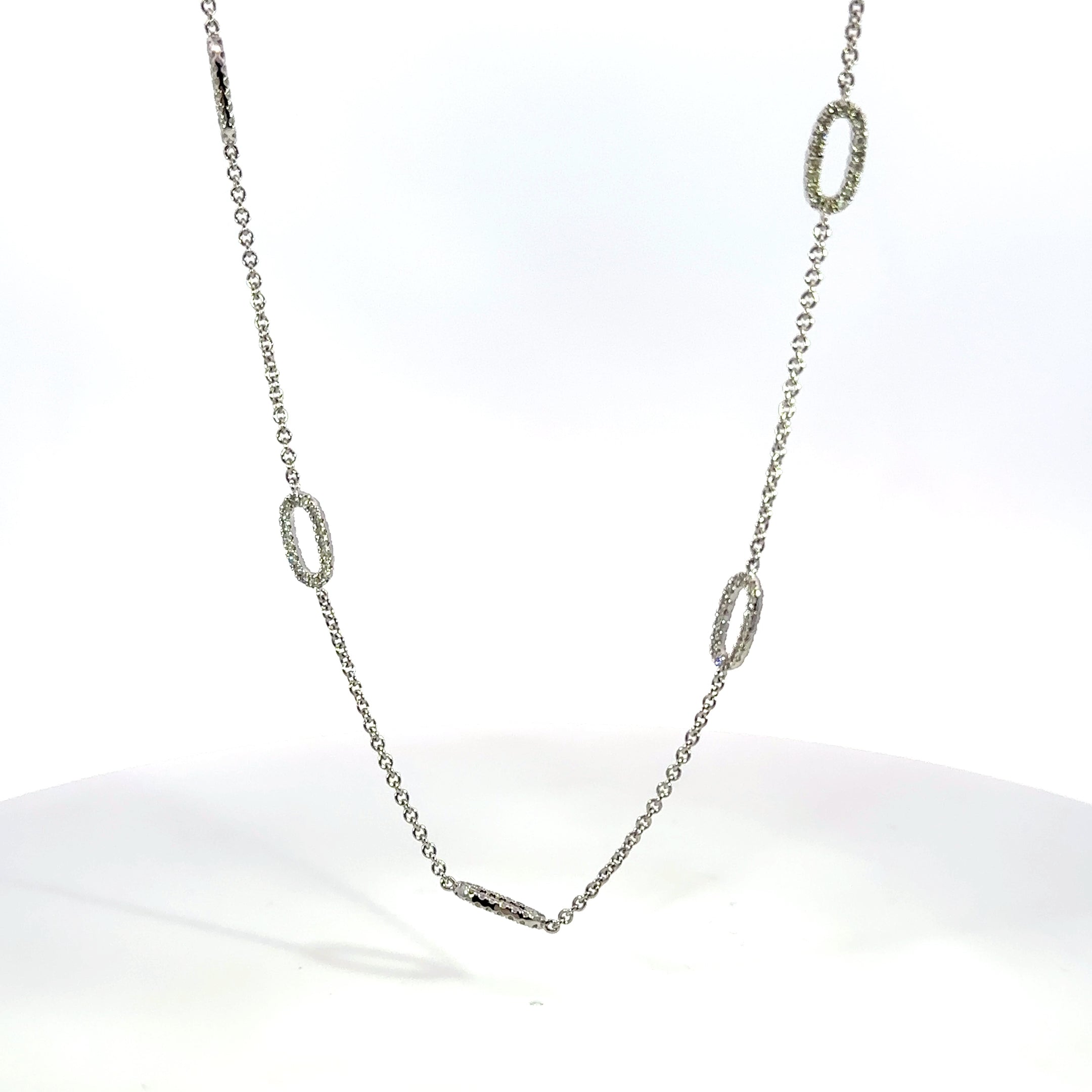 18kt wg dia flat oval link nec