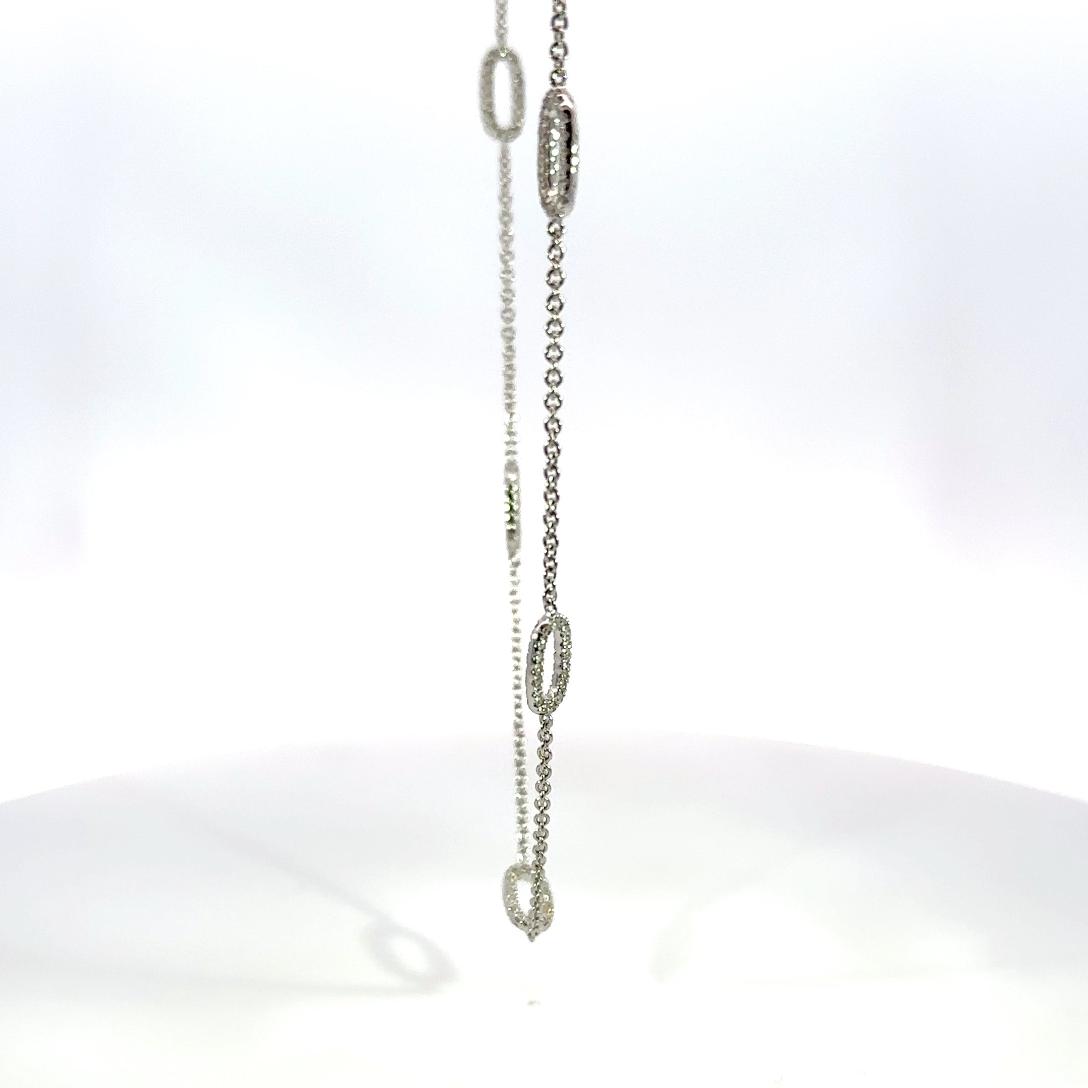 18kt wg dia flat oval link nec