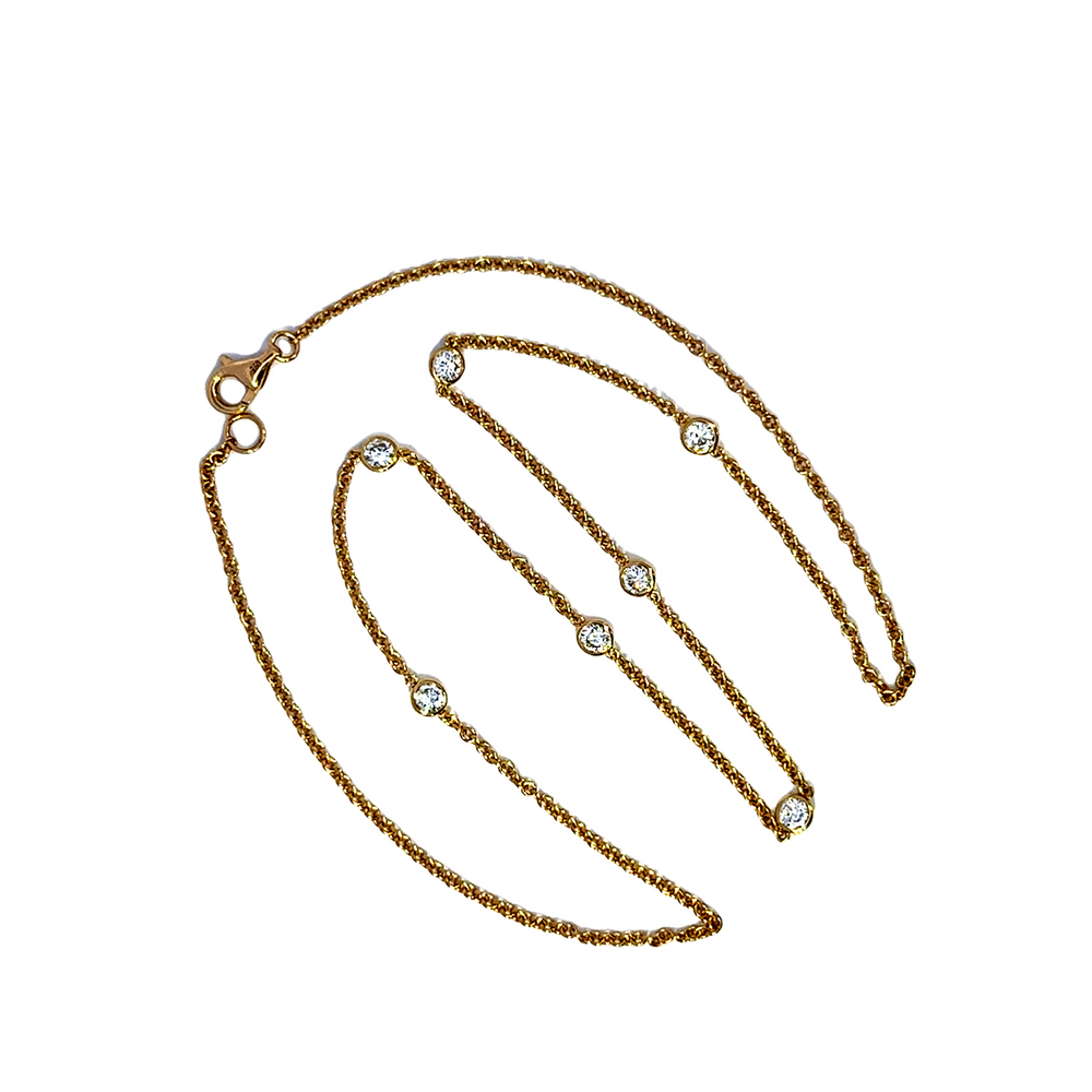 18k yg DBY necklace
7 Dia = .