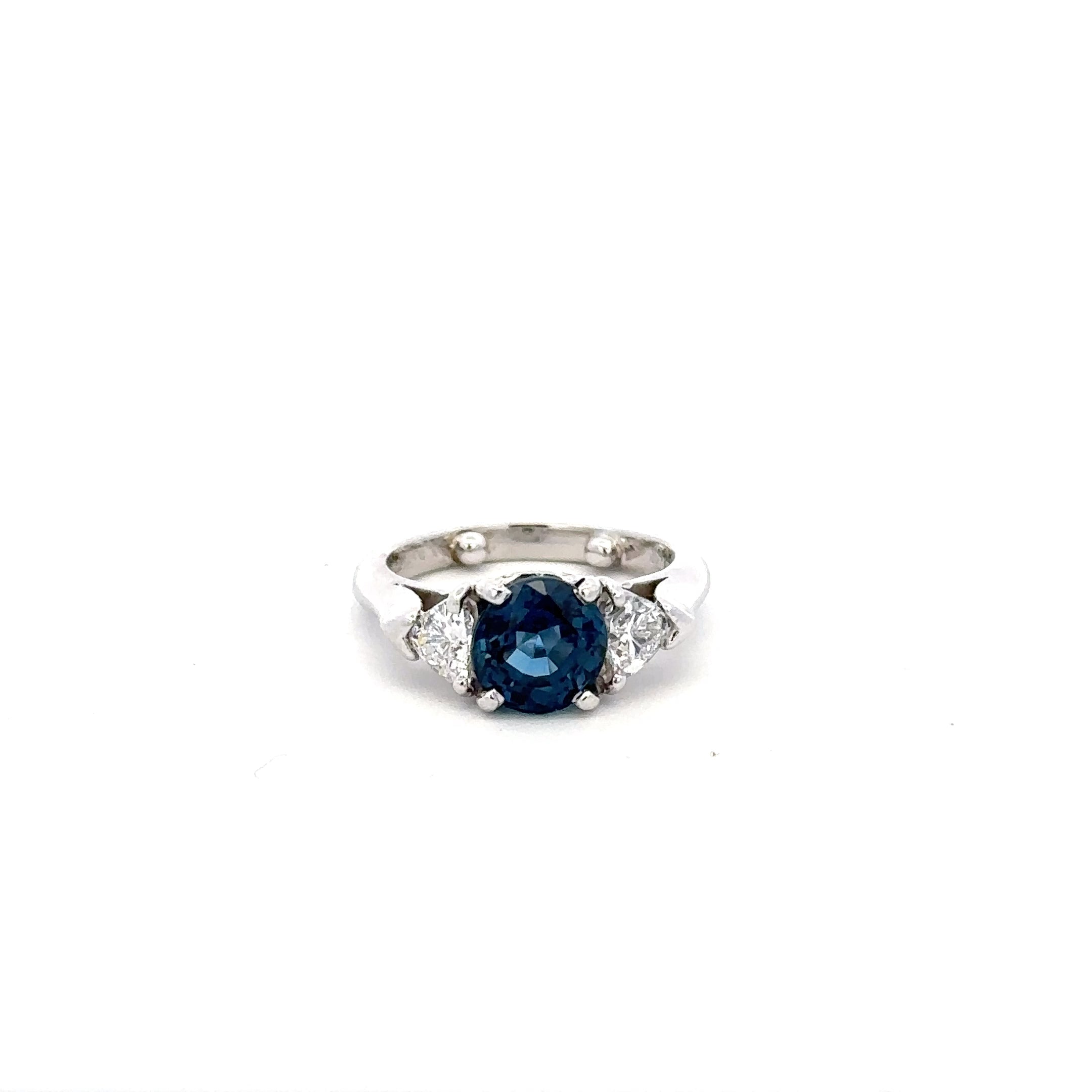 Platinum Sapphire Ring with Trillion Diamond Sides