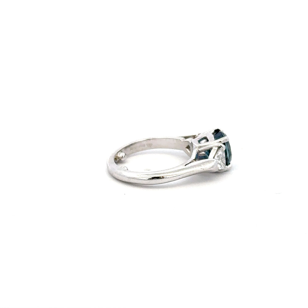 Platinum Sapphire Ring with Trillion Diamond Sides