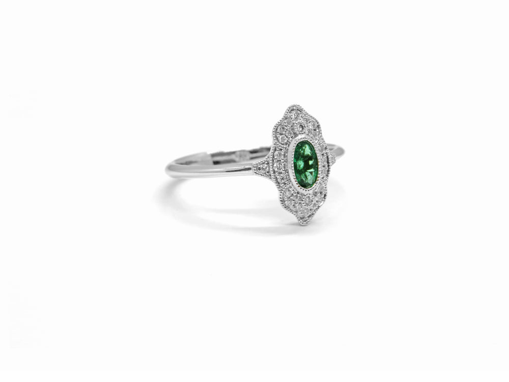 18kt White Gold Nemati Design Oval shaped Emerald & Diamond Filigree Ring