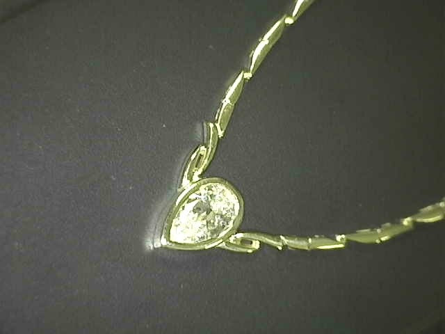 -E- 18kt Yellow Gold Pear Shap