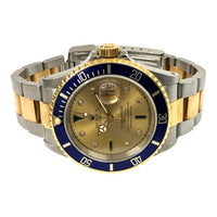 Submariner Date 40mm Blue Bezel "Serti Dial" Steel and Yellow Gold 16613SG