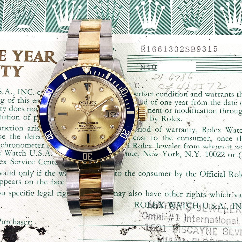 Submariner Date 40mm Blue Bezel "Serti Dial" Steel and Yellow Gold 16613SG