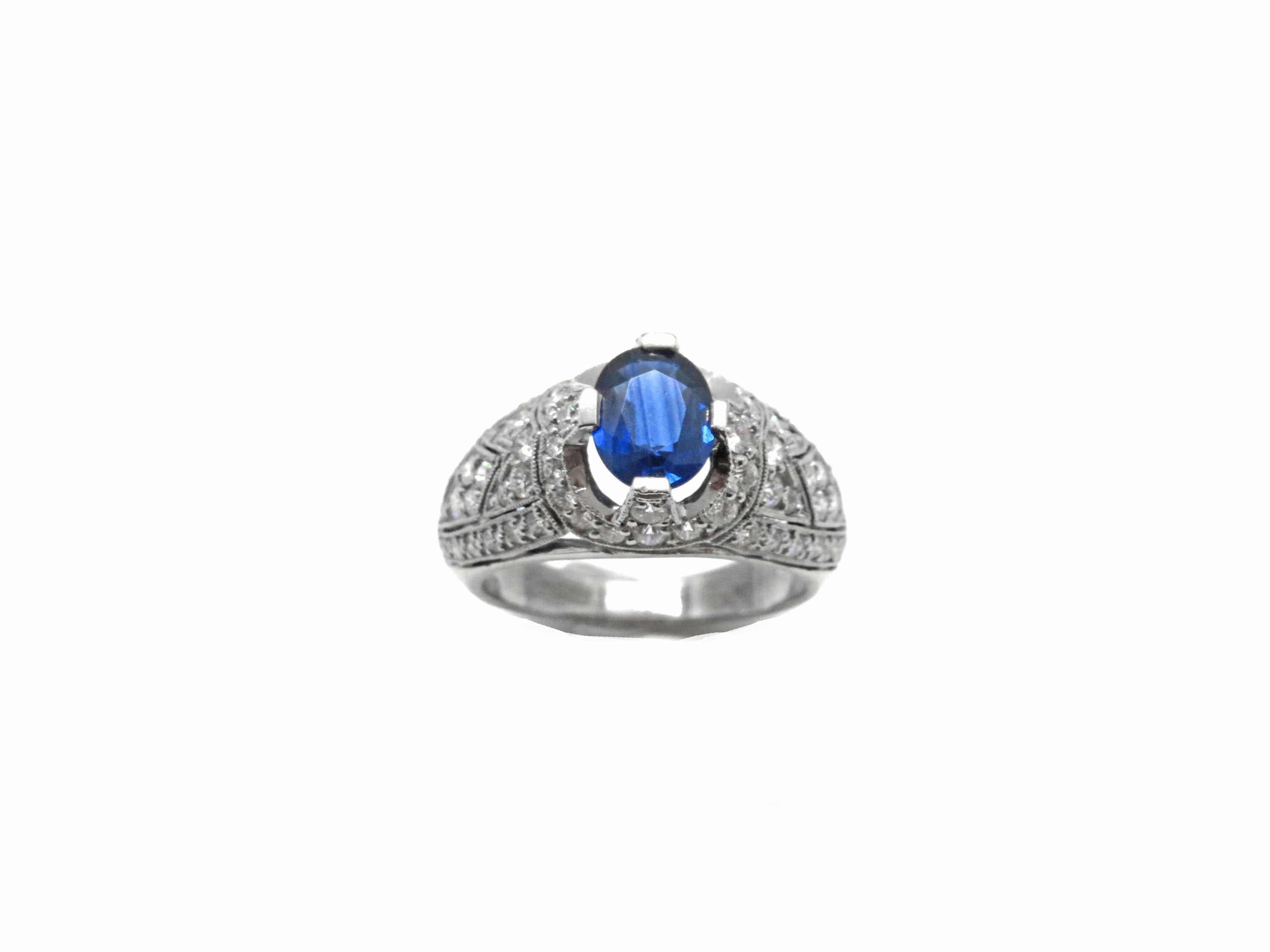 18kt White Gold Oval Blue Sapphire with Micro Pave Diamond Ring