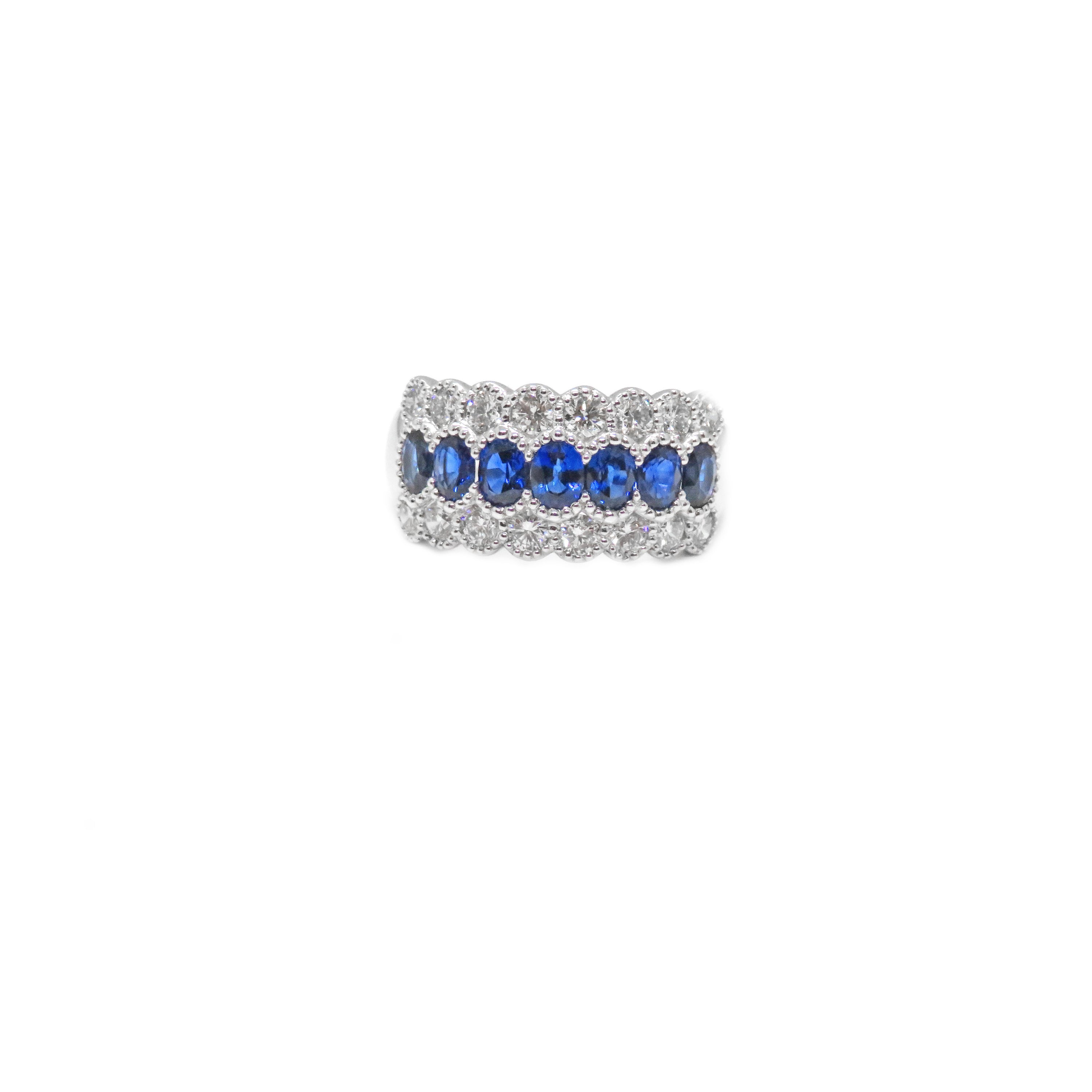 18kt White Gold Spark Design Fashion Ring with Seven Oval Blue Sapphires