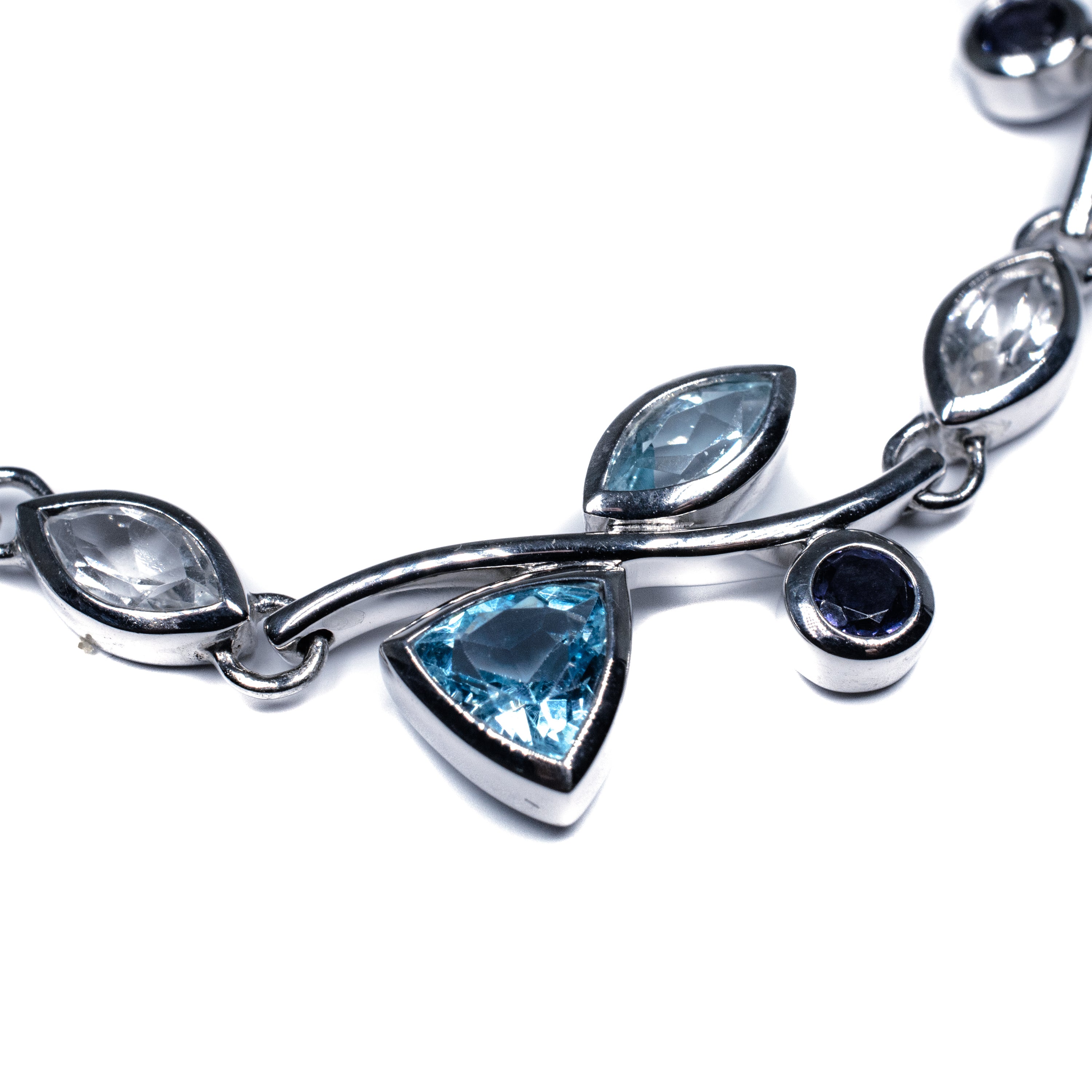 Silver Floral Bracelet with Blue Topaz, White Topaz & Lolite – Petal Design