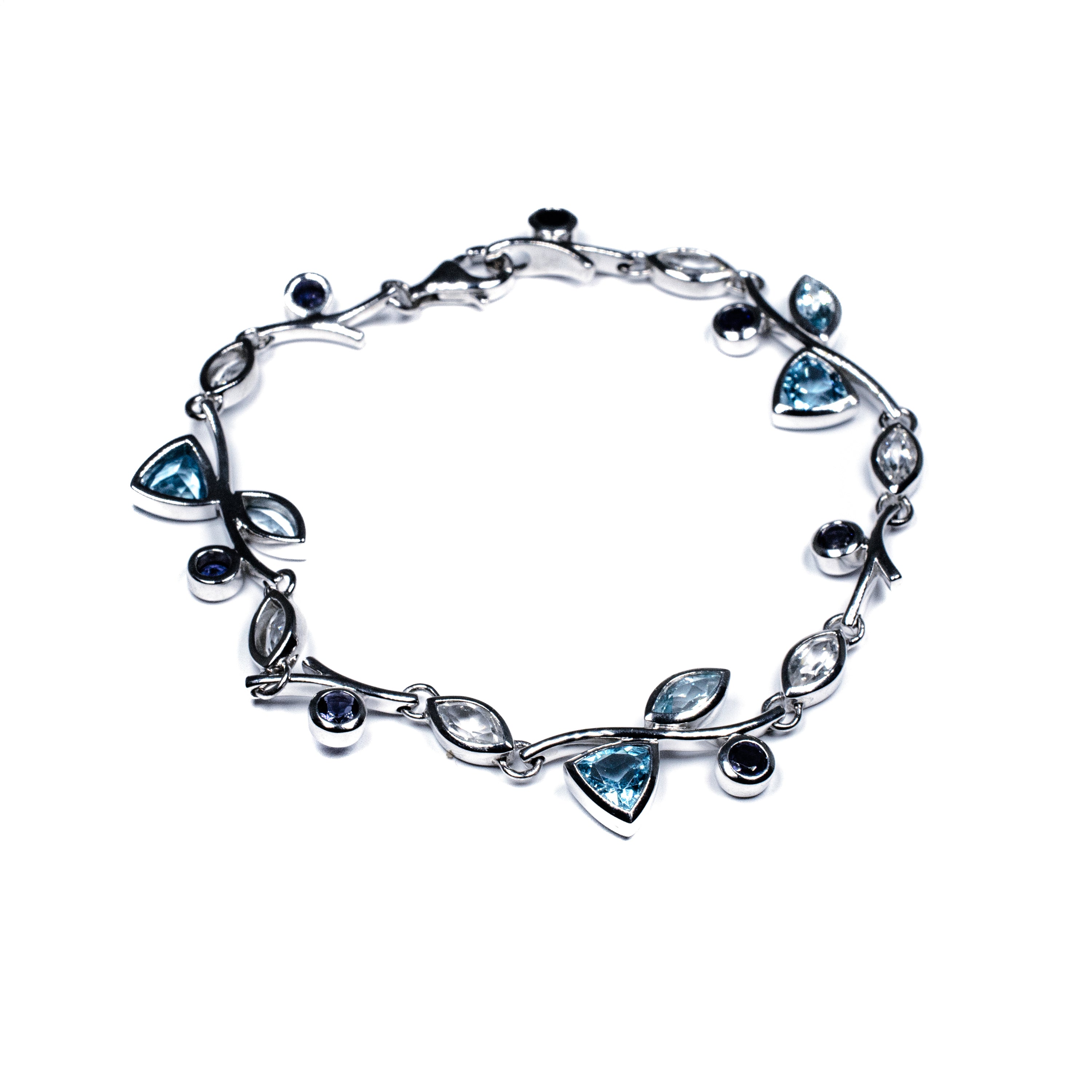 Silver Floral Bracelet with Blue Topaz, White Topaz & Lolite – Petal Design