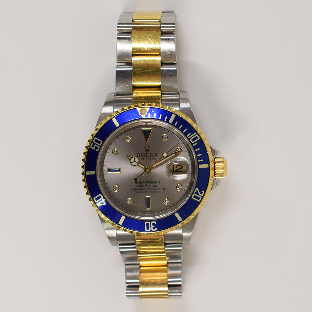 Submariner Date 40mm Blue Bezel "Serti Dial" Steel and Yellow Gold 16613SG