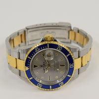Submariner Date 40mm Blue Bezel "Serti Dial" Steel and Yellow Gold 16613SG