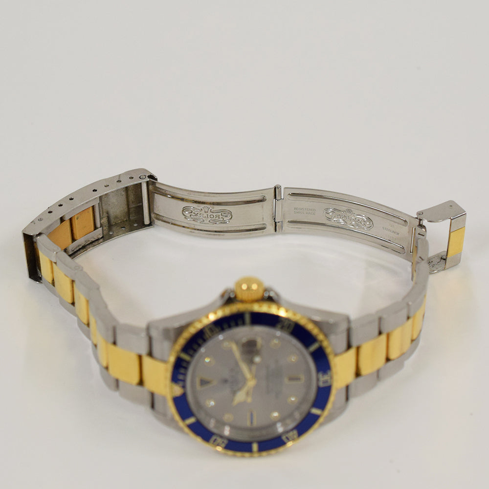 Submariner Date 40mm Blue Bezel "Serti Dial" Steel and Yellow Gold 16613SG