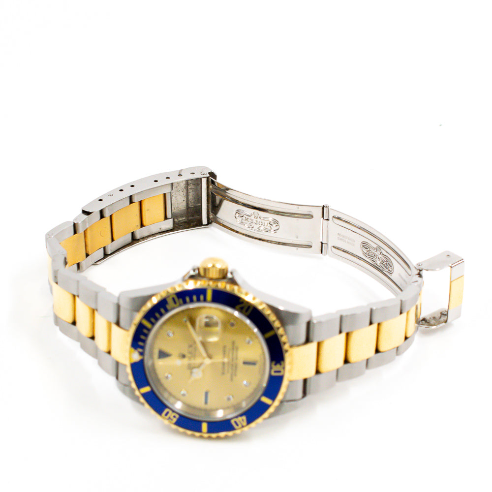 Submariner Date 40mm Blue Bezel "Serti Dial" Steel and Yellow Gold 16613SG