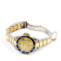 Submariner Date 40mm Blue Bezel "Serti Dial" Steel and Yellow Gold 16613SG