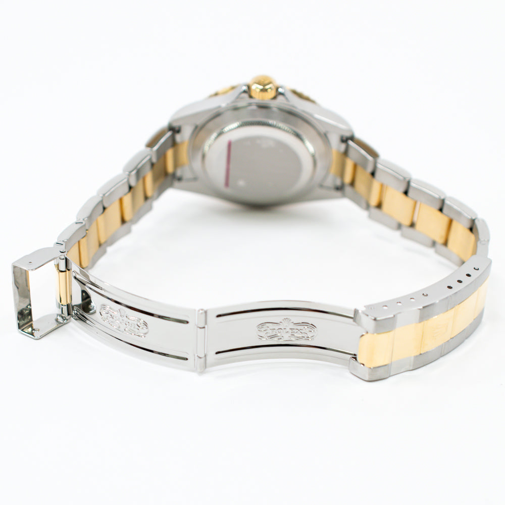 Submariner Date 40mm Blue Bezel "Serti Dial" Steel and Yellow Gold 16613SG