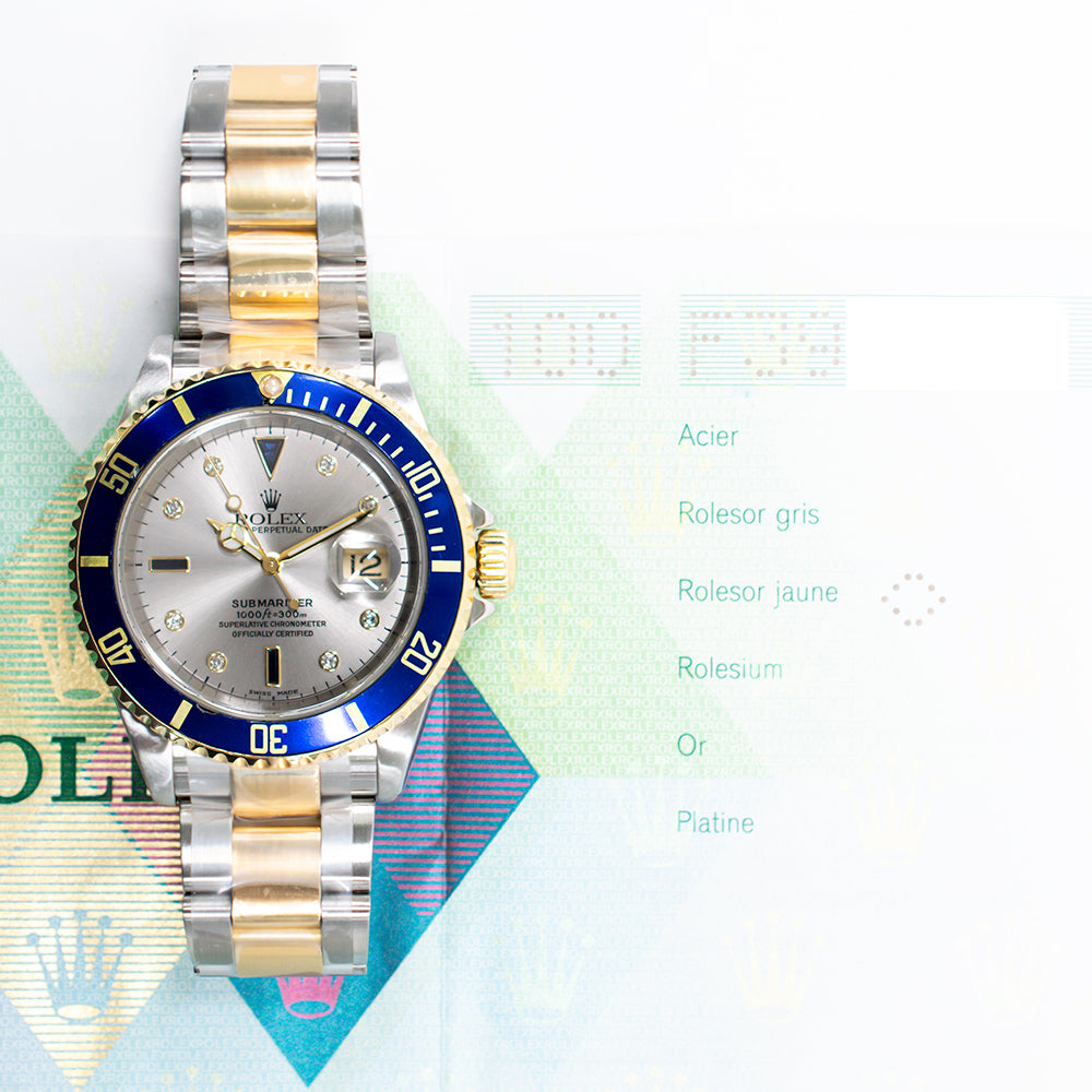 Submariner Date 40mm Blue Bezel "Serti Dial" Steel and Yellow Gold 16613SG