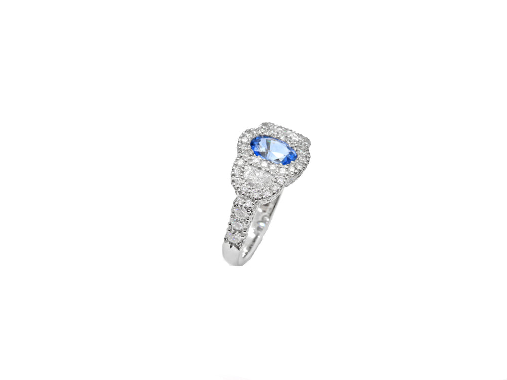 Platinum with Oval Faceted Sapphire and Micro Pave Diamond Fashion Ring