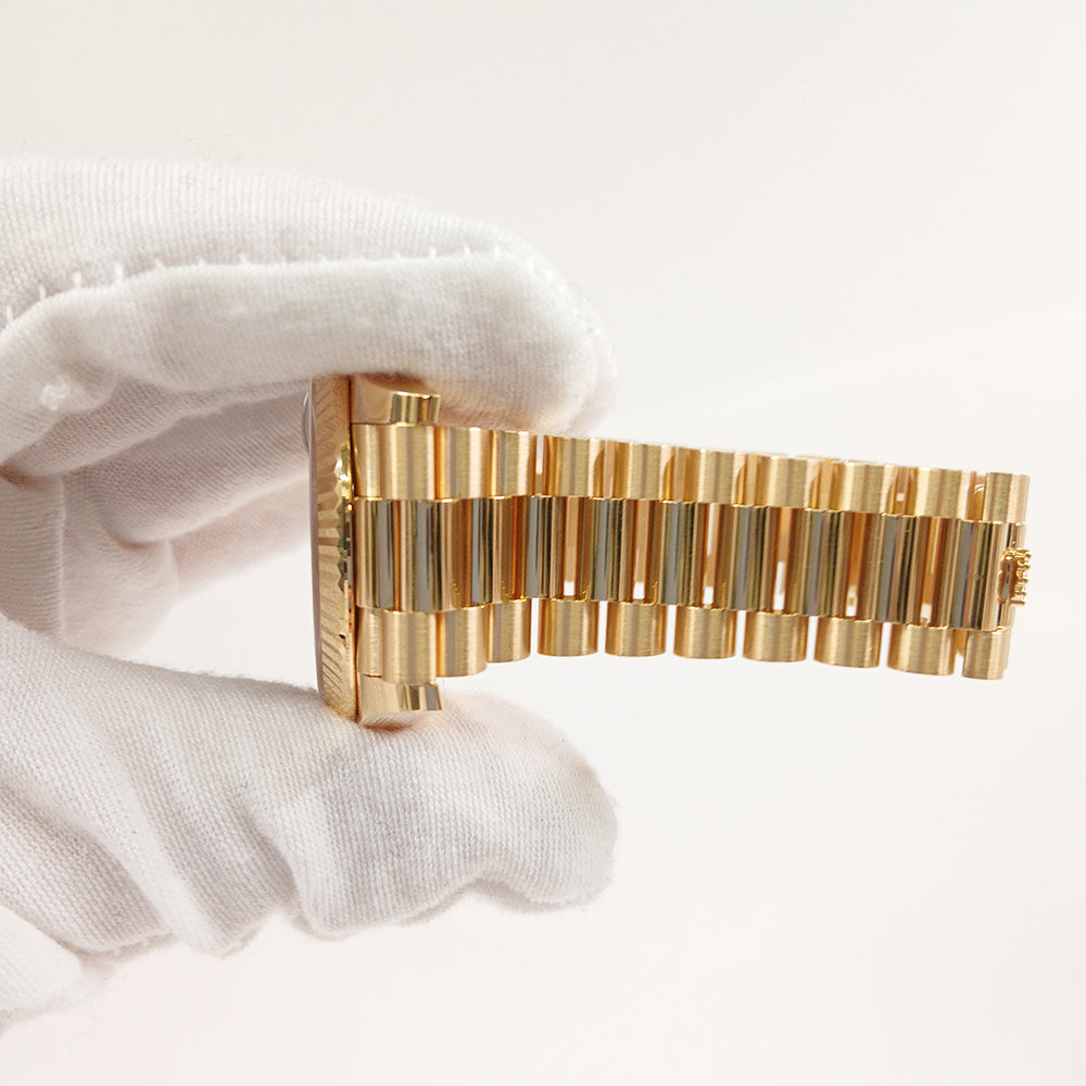 Day-Date President 40mm Onyx  Baguette Diamond Dial Yellow Gold 228238A