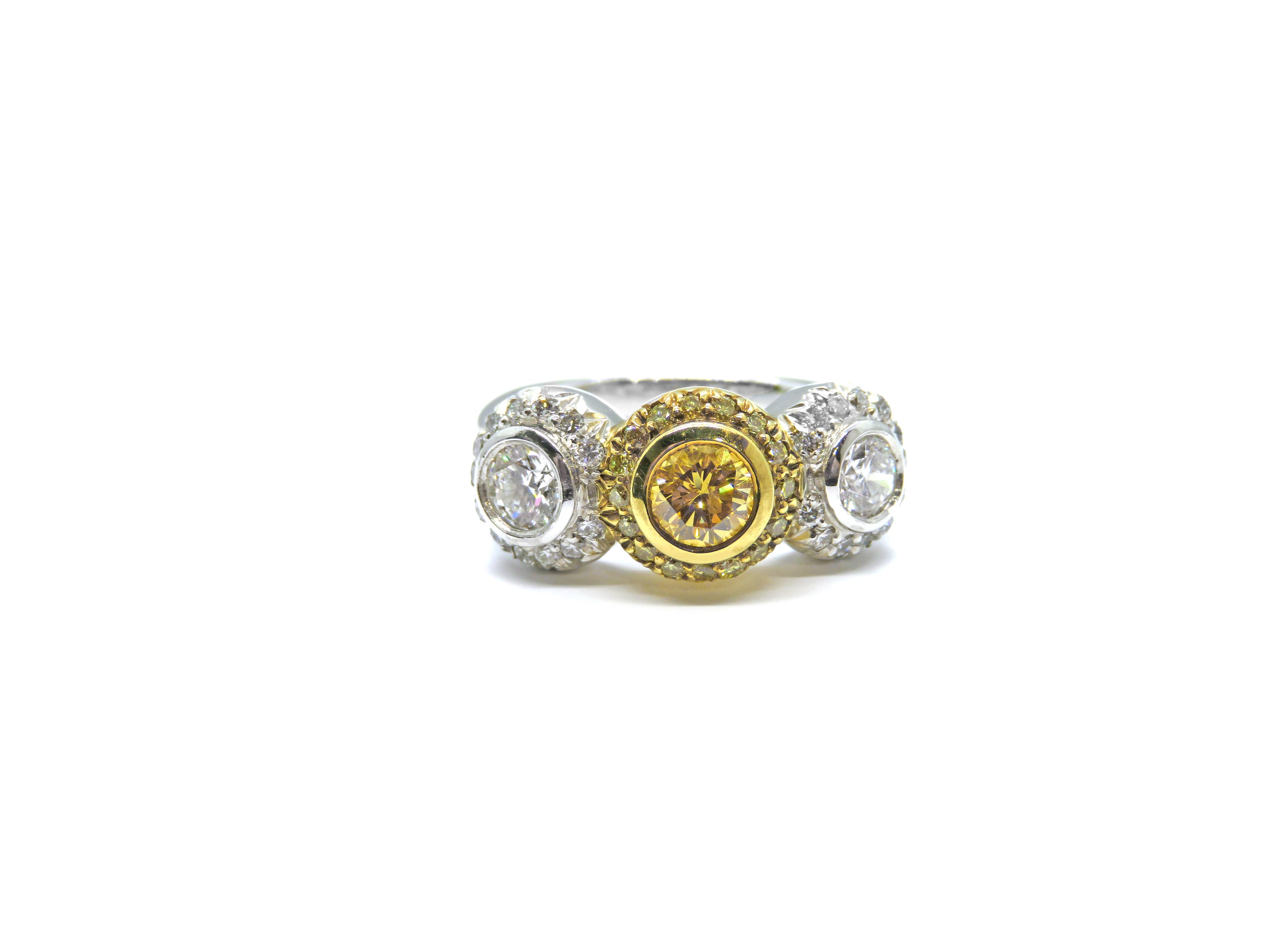 Platinum with 18kt Yellow Gold 3 Stone Fancy Yellow and White Diamond Engagement Ring