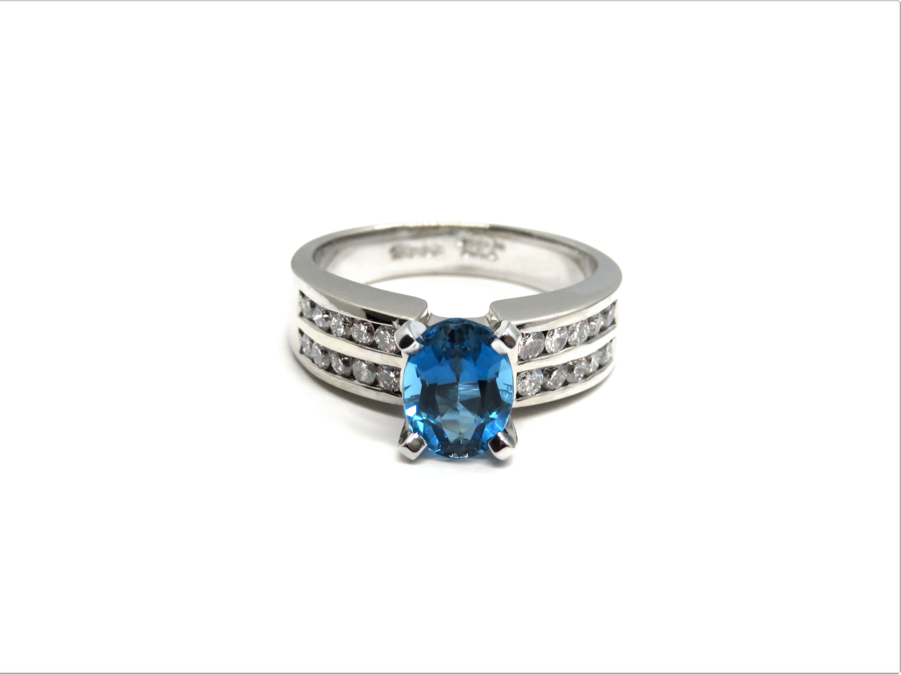 18kt White Gold Blue Topaz and Diamond Fashion Ring